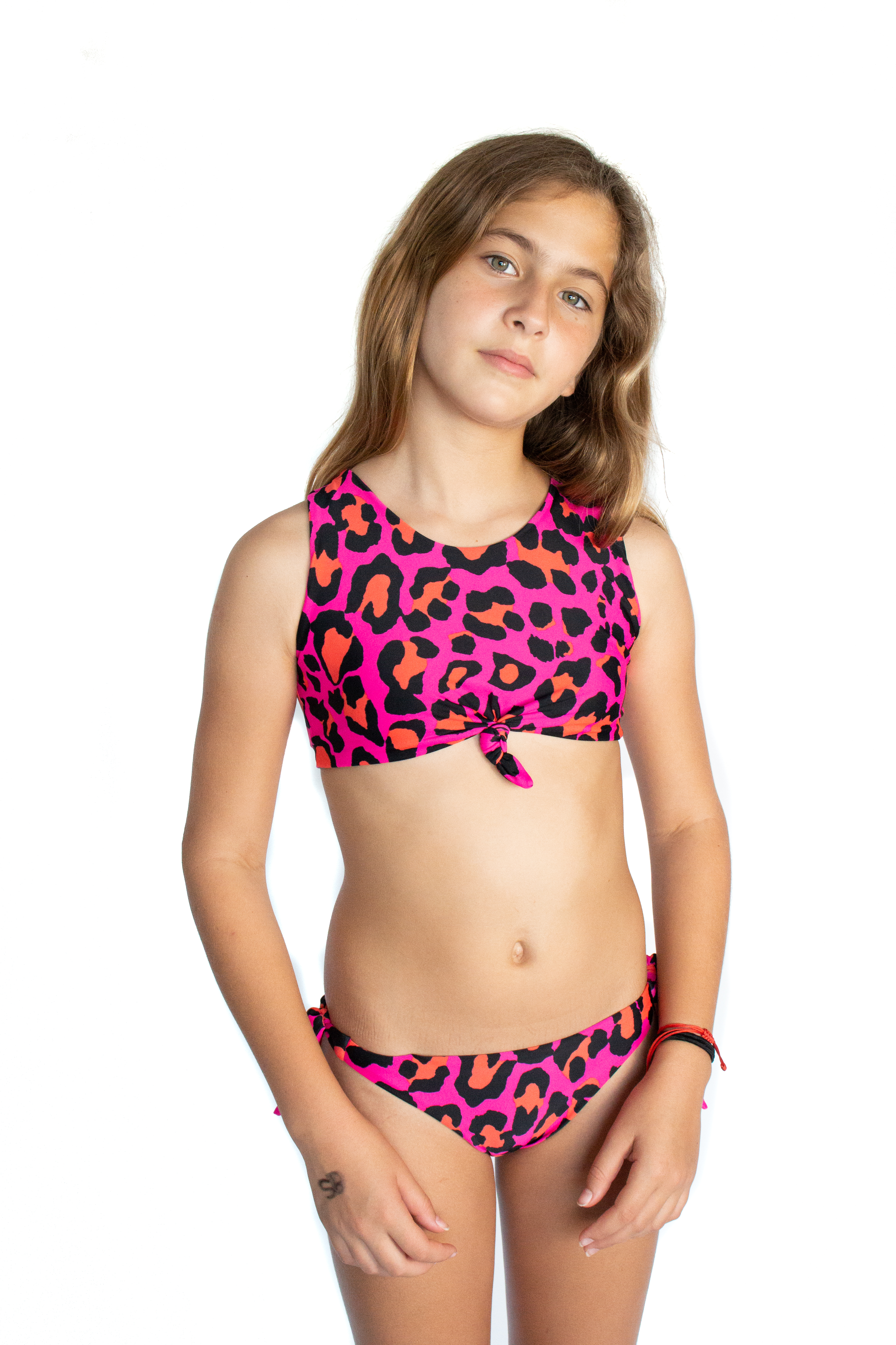 A vibrant pink animal print bikini swimsuit for kids, featuring a playful design and comfortable fit.