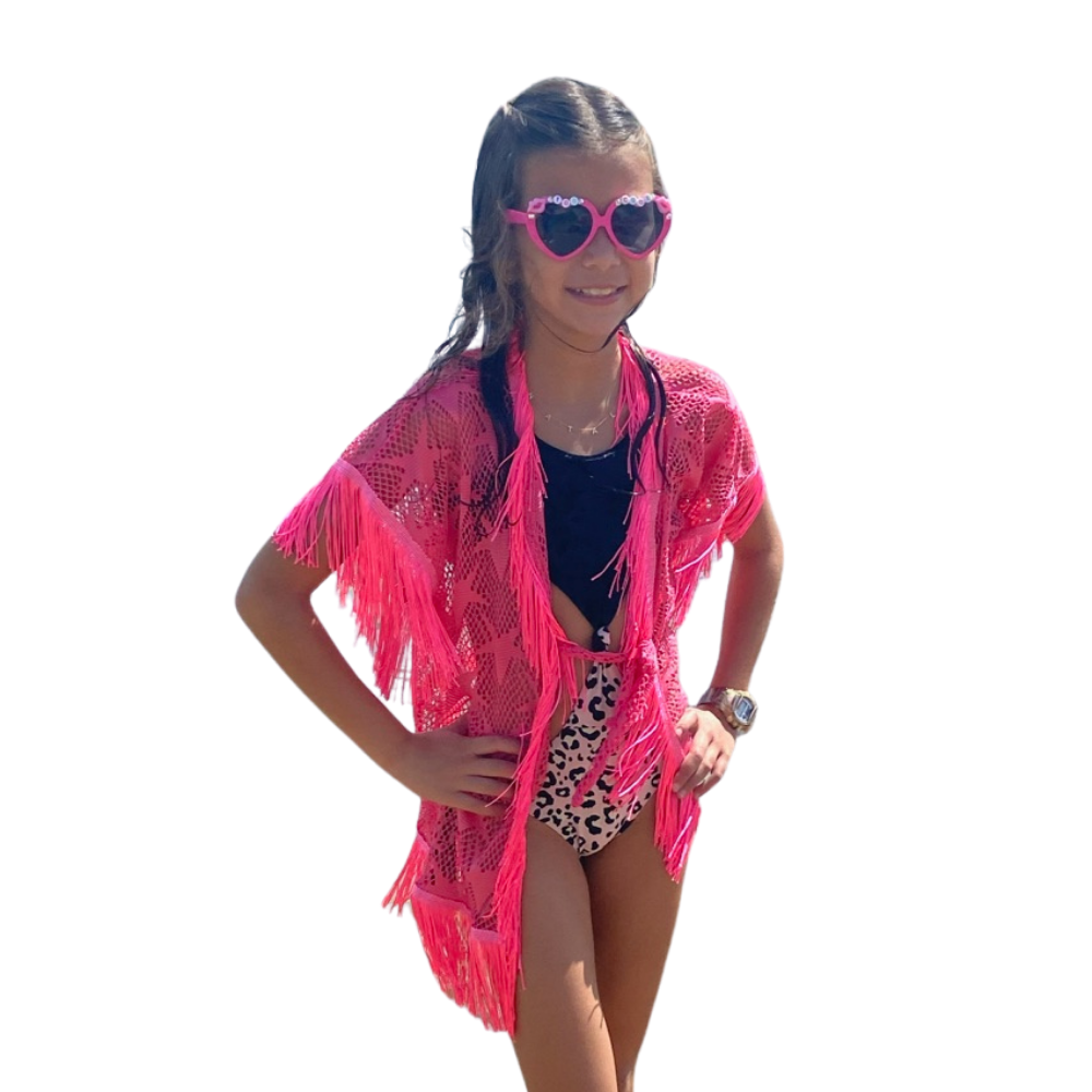 A stylish pink mesh cover up with star patterns, perfect for beach and poolside wear, showcasing its lightweight and breathable fabric.