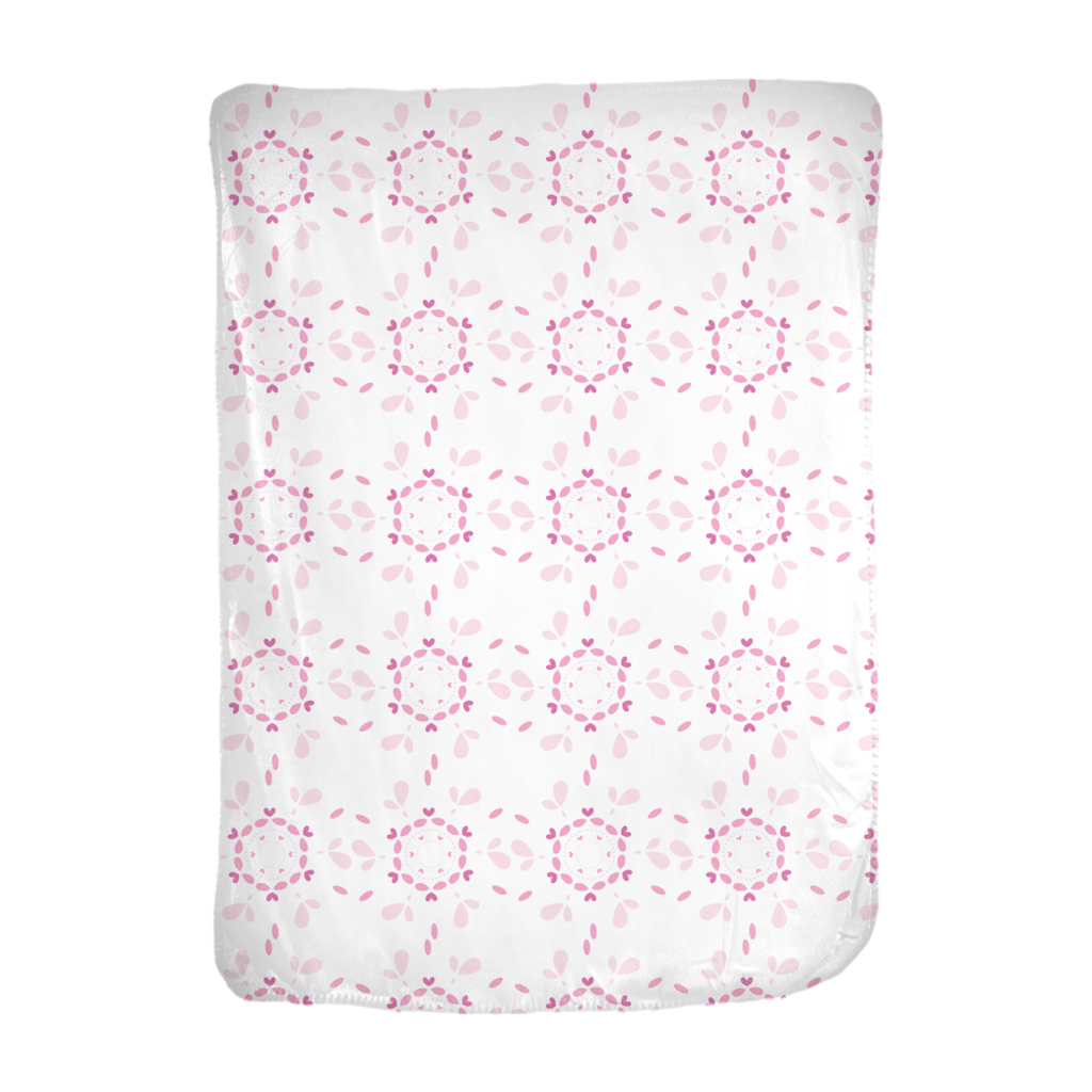 A cozy Pink Flora Minky Blanket featuring a soft velveteen texture and a beautiful floral design, perfect for snuggling.