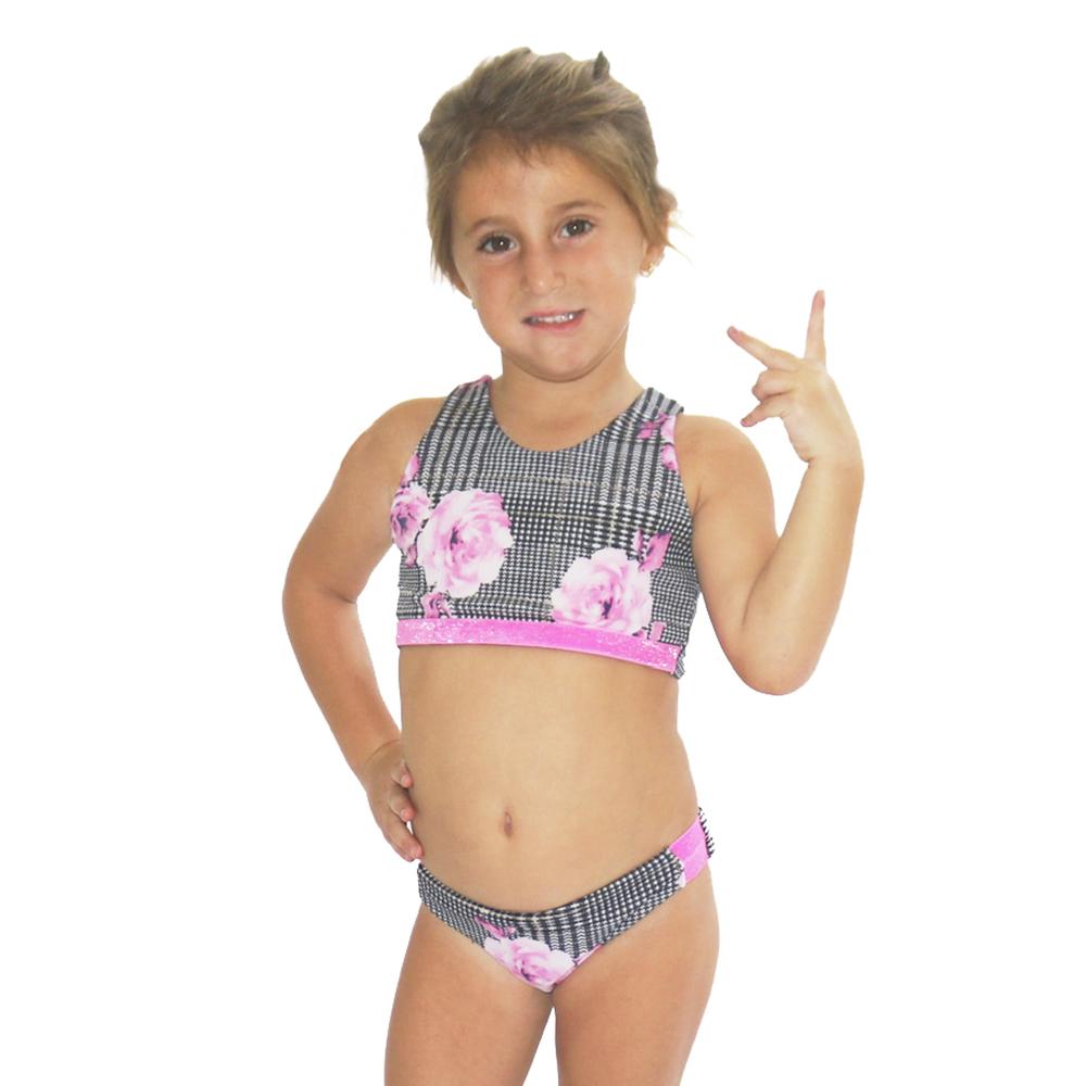 Pinky Rain Bikini for kids featuring vibrant geometric and floral prints, designed for comfort and style in outdoor activities.