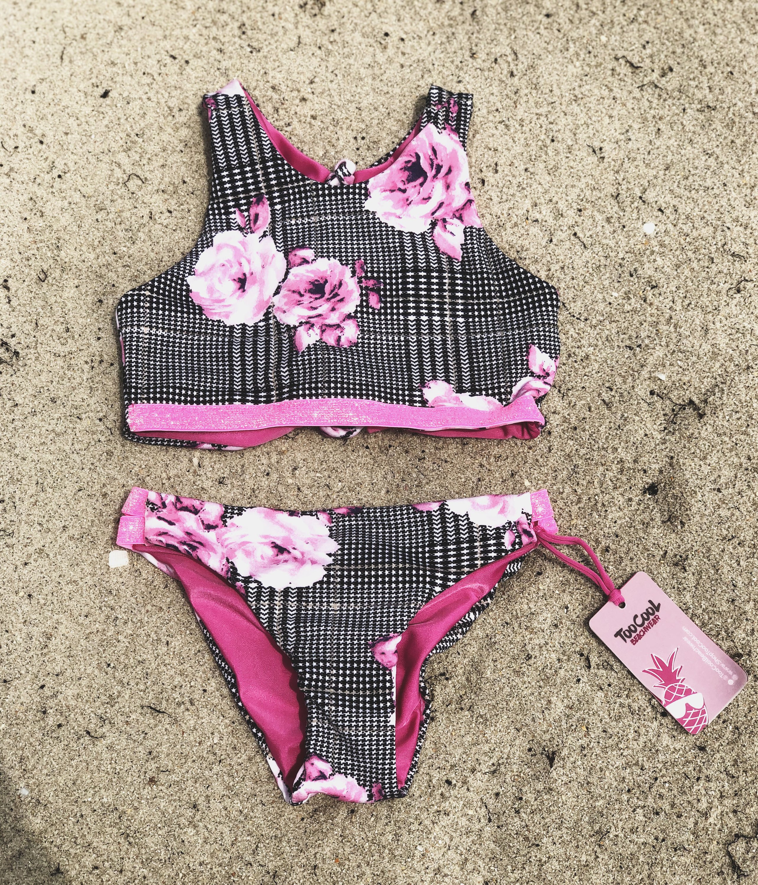 Pinky Rain Bikini for kids featuring vibrant geometric and floral prints, designed for comfort and style in outdoor activities.