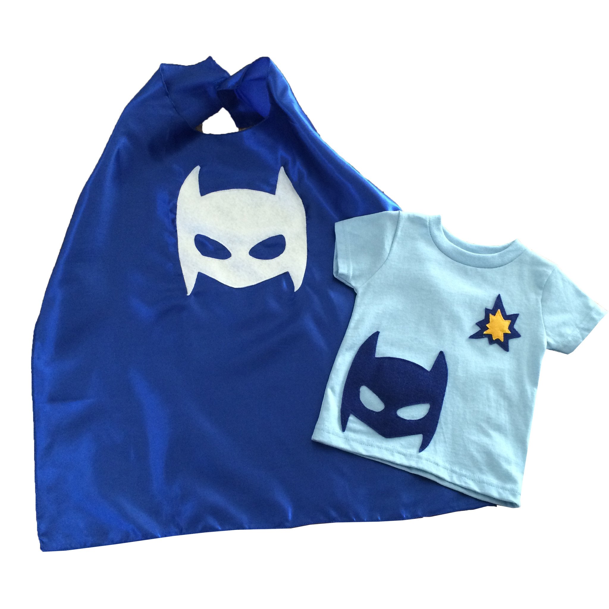 A vibrant blue superhero tee with a matching cape, featuring felt appliqué designs, perfect for imaginative play.