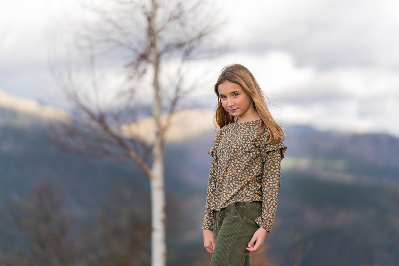 Vermont Khaki Print Shirt featuring floral design, round neck, and ruffled sleeves, made from organic cotton.