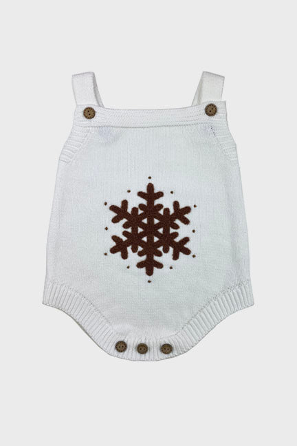 A cozy white knitted onesie for babies featuring a brown crochet snowflake design and wooden button details, perfect for holiday wear.