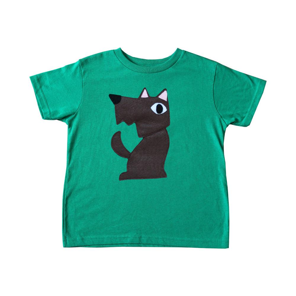 A handmade kids T-shirt featuring an appliqu̩e design of Toto the Dog from The Wonderful Wizard of Oz, crafted with eco-friendly materials.