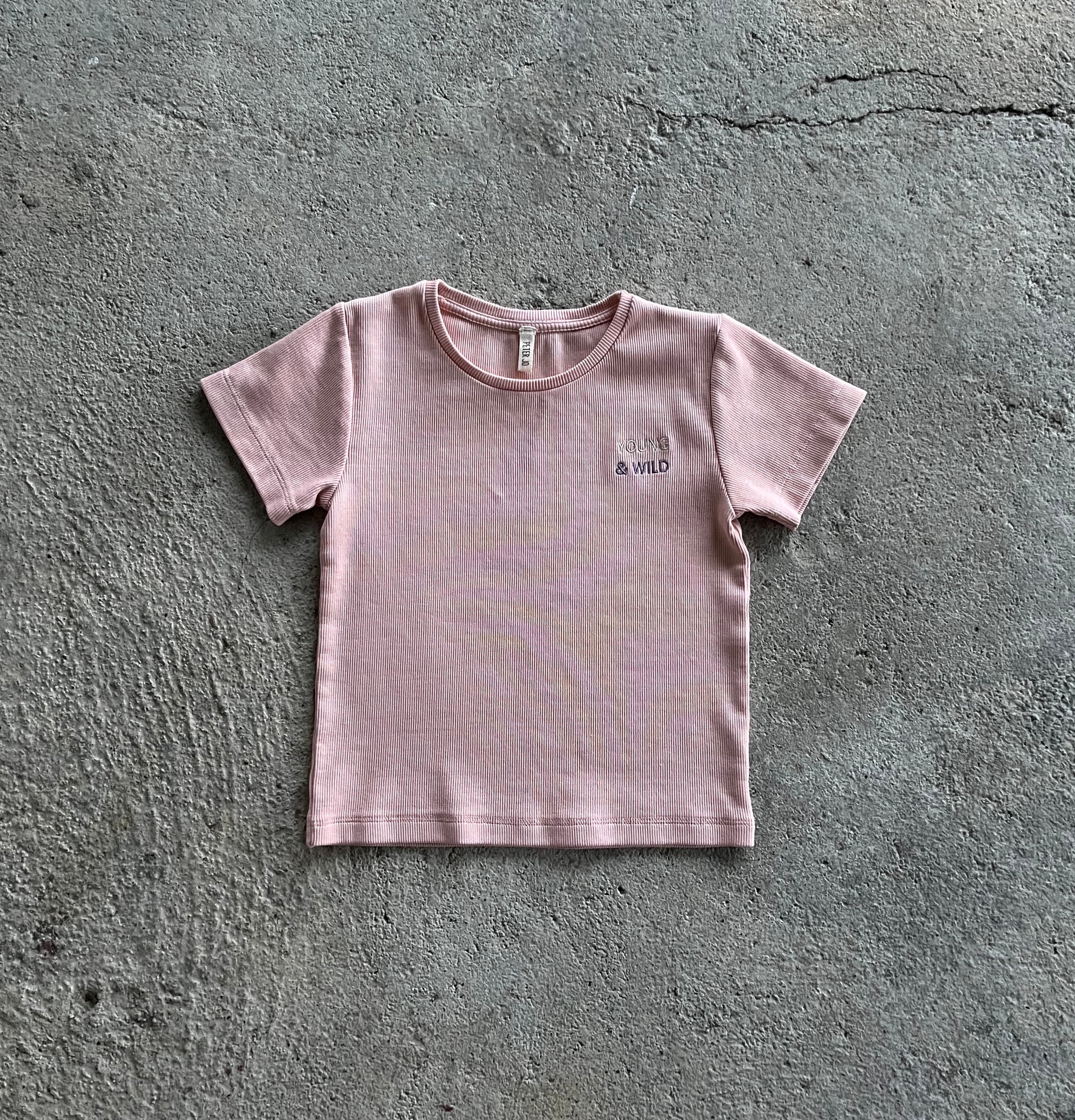 T-Shirt Louise Pink made from organic cotton, featuring a soft ribbed texture and elasticised waist, perfect for babies and toddlers.