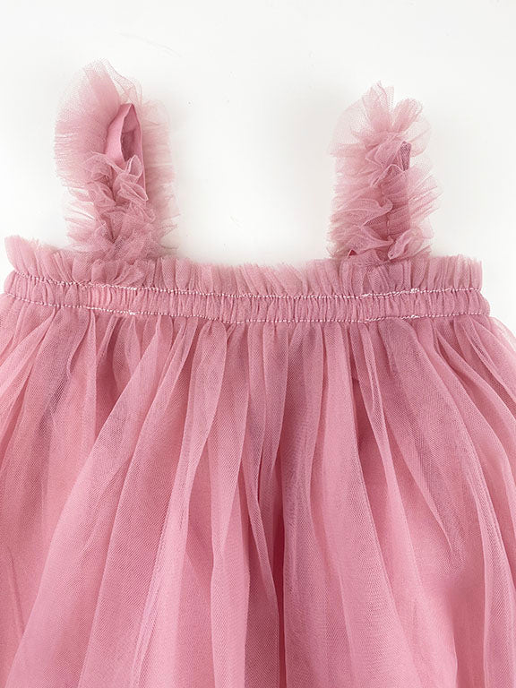 A beautiful mauve tulle A-line dress featuring a cotton under layer and tulle top layer, perfect for little girls' parties.