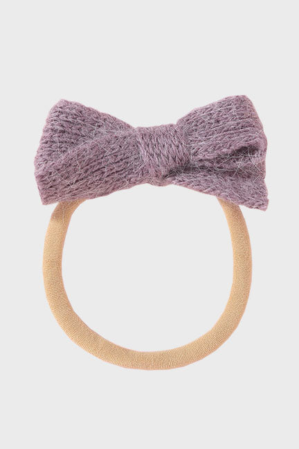 A cozy wool bow headband for babies, featuring a soft nylon band and a stylish 3-inch bow, available in multiple colors.