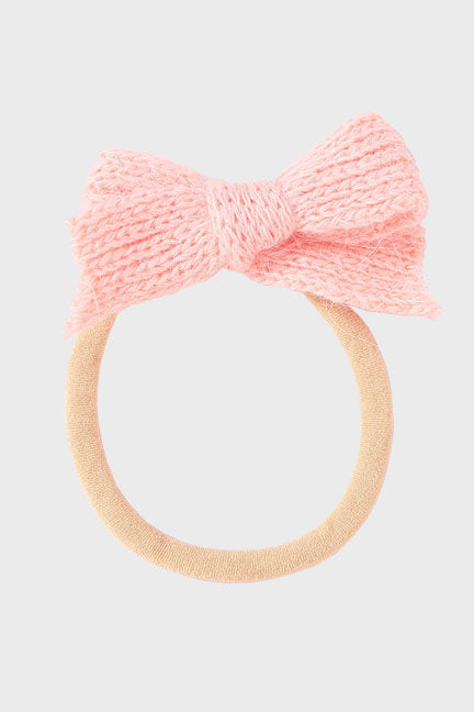 A cozy wool bow headband for babies, featuring a soft nylon band and a stylish 3-inch bow, available in multiple colors.