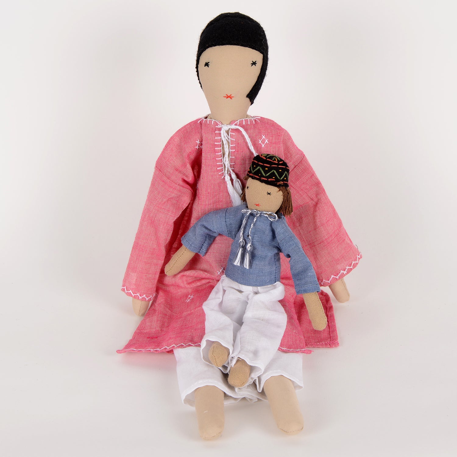 Ayu Mom&Mini doll set featuring an elegant Indian baby doll in traditional attire and a smaller version made from discarded fabric, showcasing cultural craftsmanship.