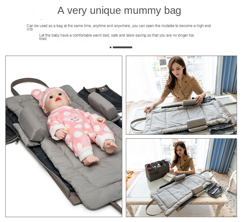 Folding Large Capacity Mother And Baby Bag in soft Oxford cloth, featuring multiple pockets and stroller attachment.