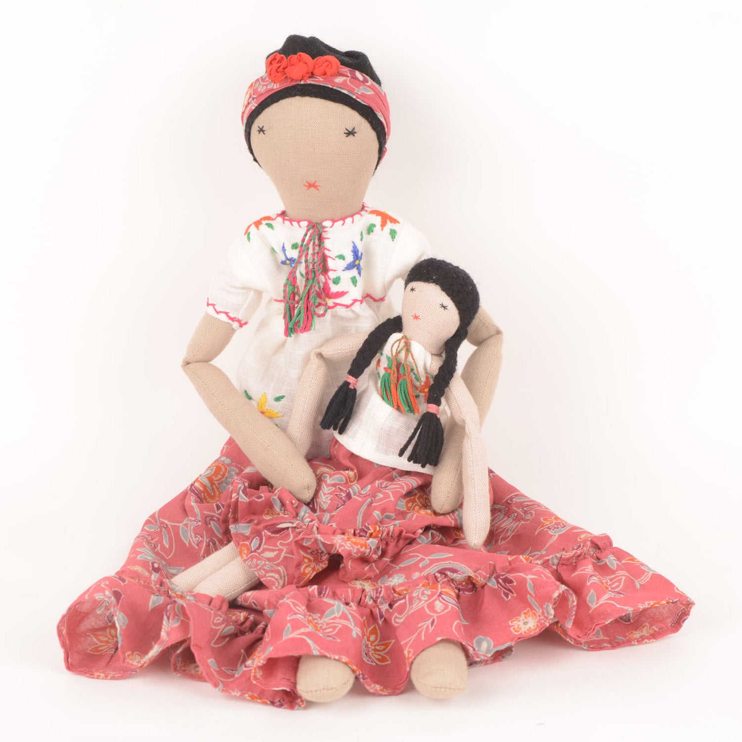 Frida Mom&Mini doll set featuring a large floral doll and a smaller version, both handcrafted by Afghan artisans with vibrant colors and intricate embroidery.