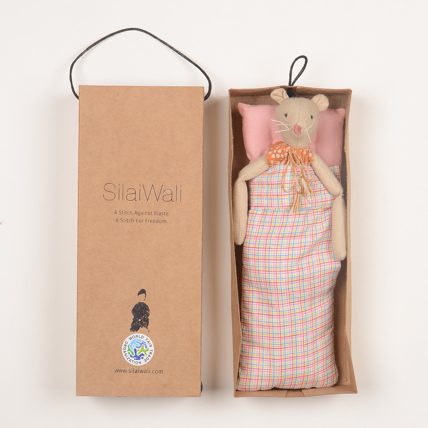 Isla Mini, a handcrafted mouse doll made from sustainable materials, featuring cotton body, woollen hair, and bedding in a foldable box.