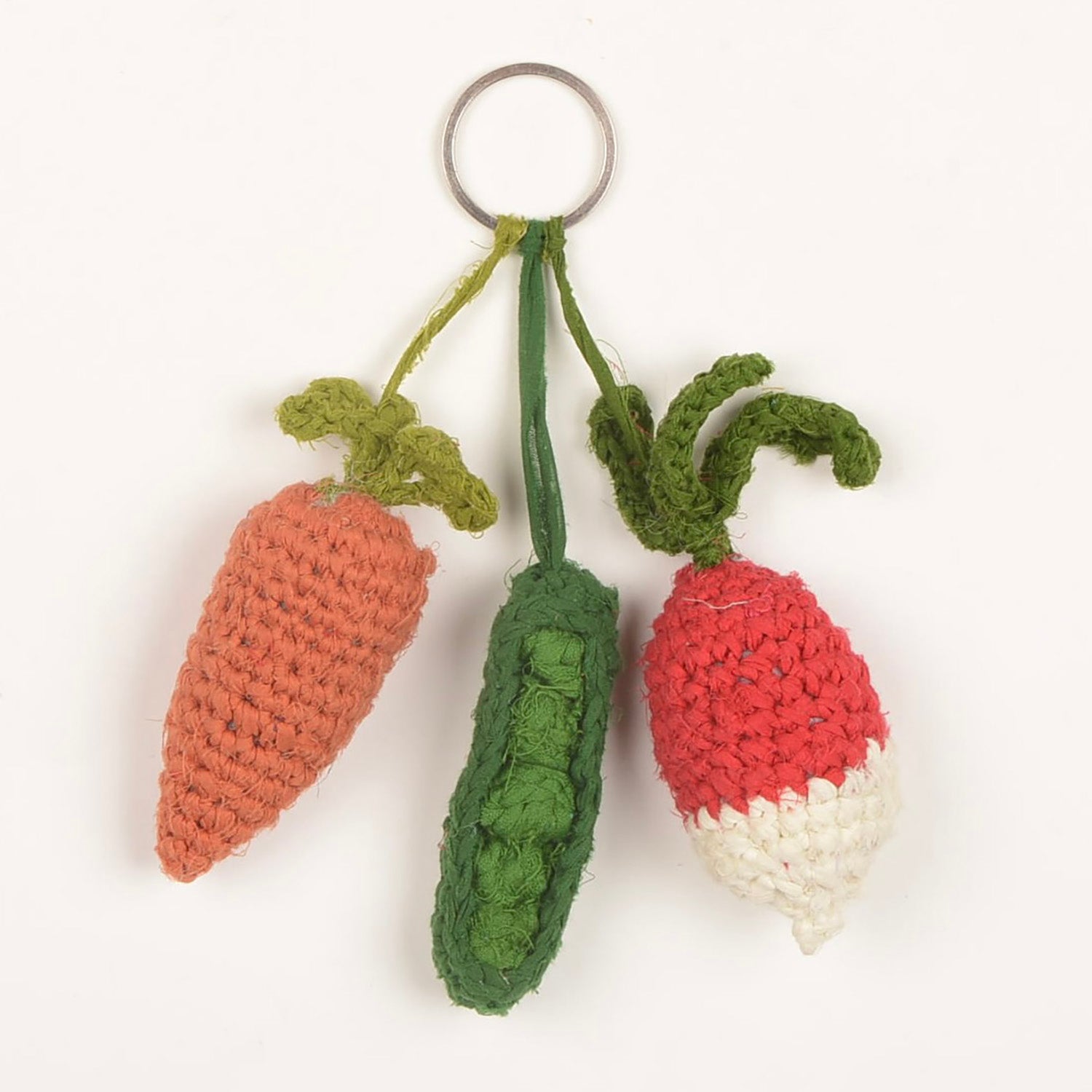 KC_Veggie_01 Key Chain handcrafted from waste fabric by Afghan artisans, featuring a colorful design and a lead-free nickel-coated metal ring.