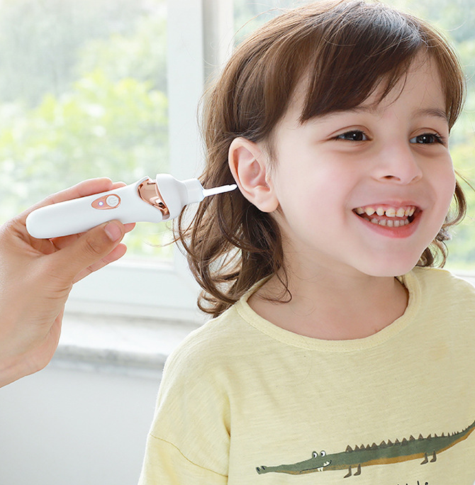 Portable rechargeable ear pick for children with luminous feature and multiple spoon heads, designed for safe ear cleaning.