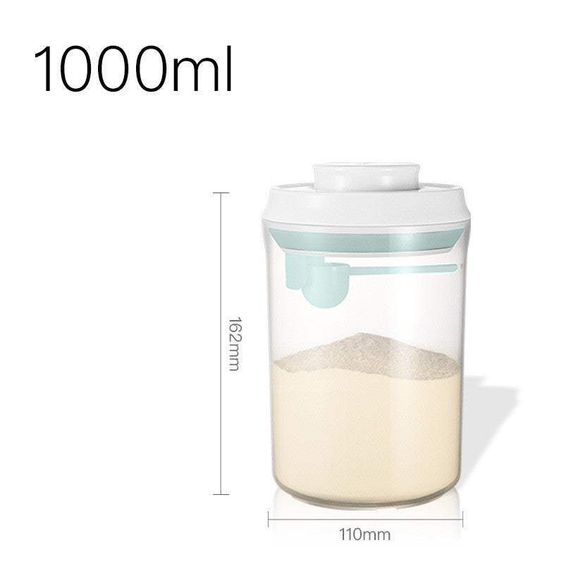 Transparent milk powder box with a one-key push-open lid, designed for moisture-proof storage and includes a hanging spoon for hygiene.