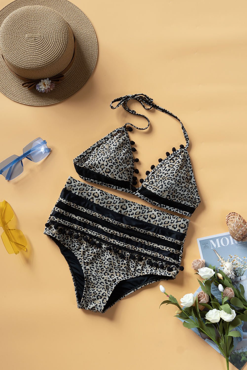 Black Leopard Stripe High Waist Bikini with tassel trim, featuring a sexy low v-neck top and high-waisted bottom, perfect for summer beach outings.