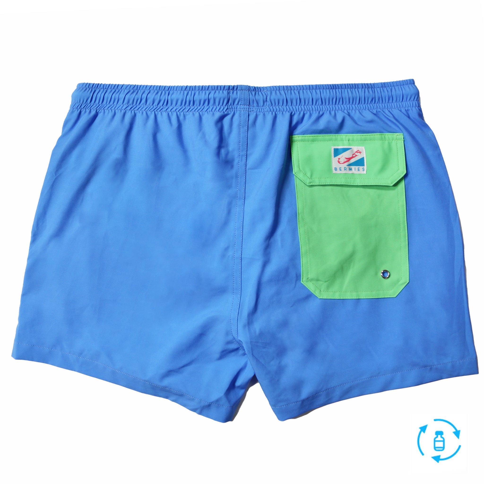 Blue swim trunks with green pocket, featuring a stylish design and eco-friendly materials.