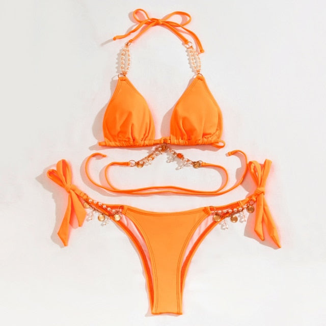 Crystal Bikini 2021 featuring a sexy pearl design, low waist, and elegant style, perfect for women looking for comfort and fashion.