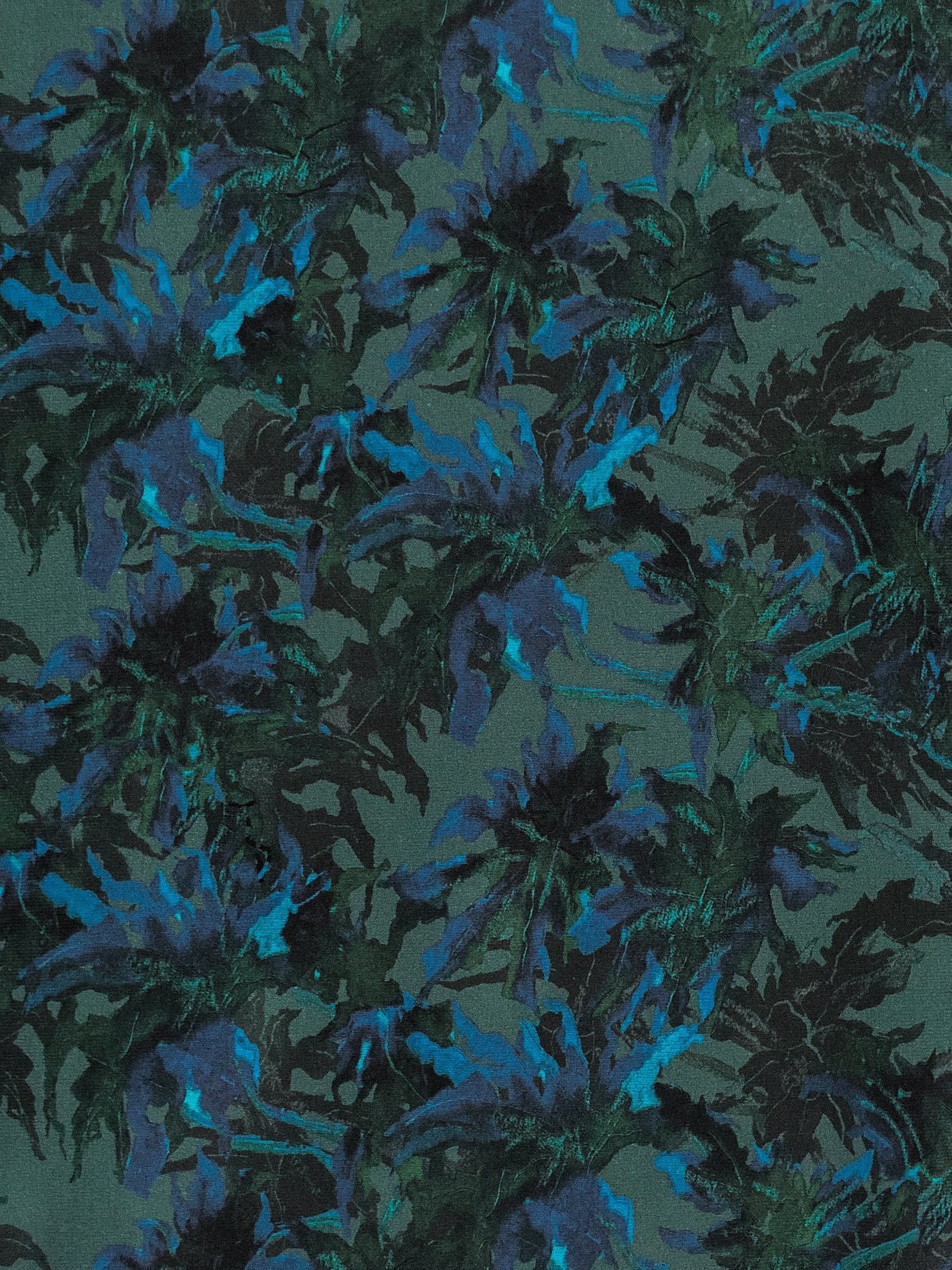 DONITA BOTTOM in SEA JUNGLE featuring high-waisted design with intricate blue and green foliage print on a khaki base.