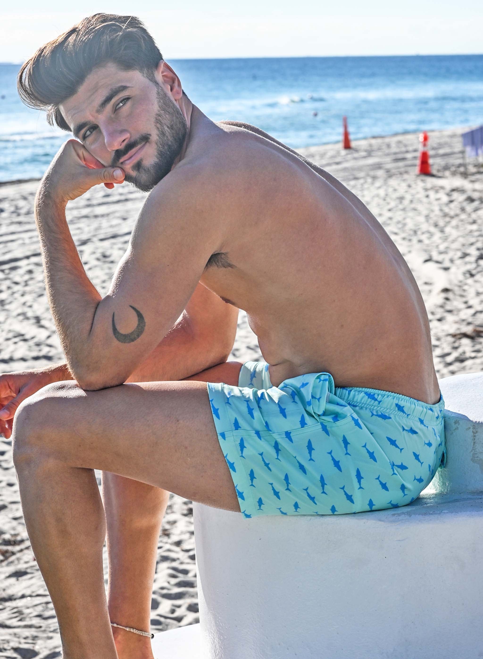 Great White 5" Swim Trunks made from recycled materials, featuring a stylish design and eco-friendly attributes.