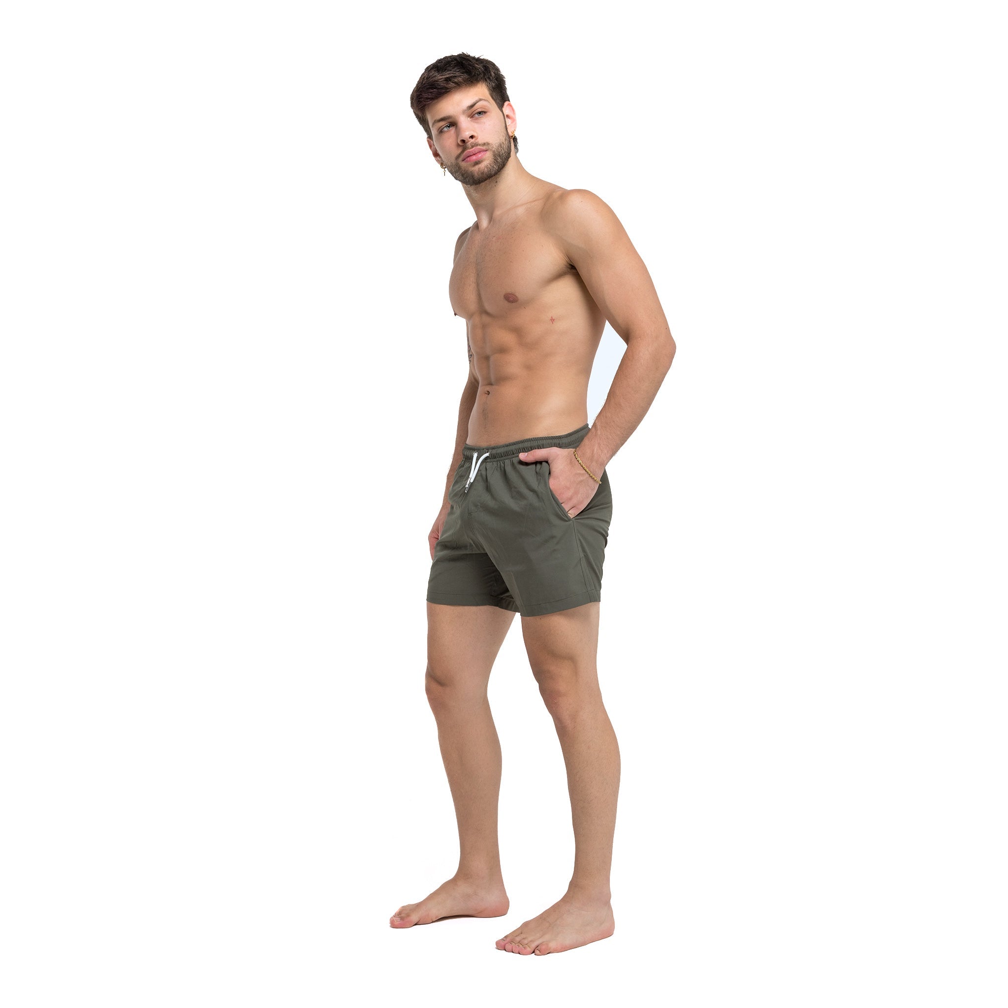 Green 5" Swim Trunks made from recycled materials, featuring a stylish design and eco-friendly attributes.