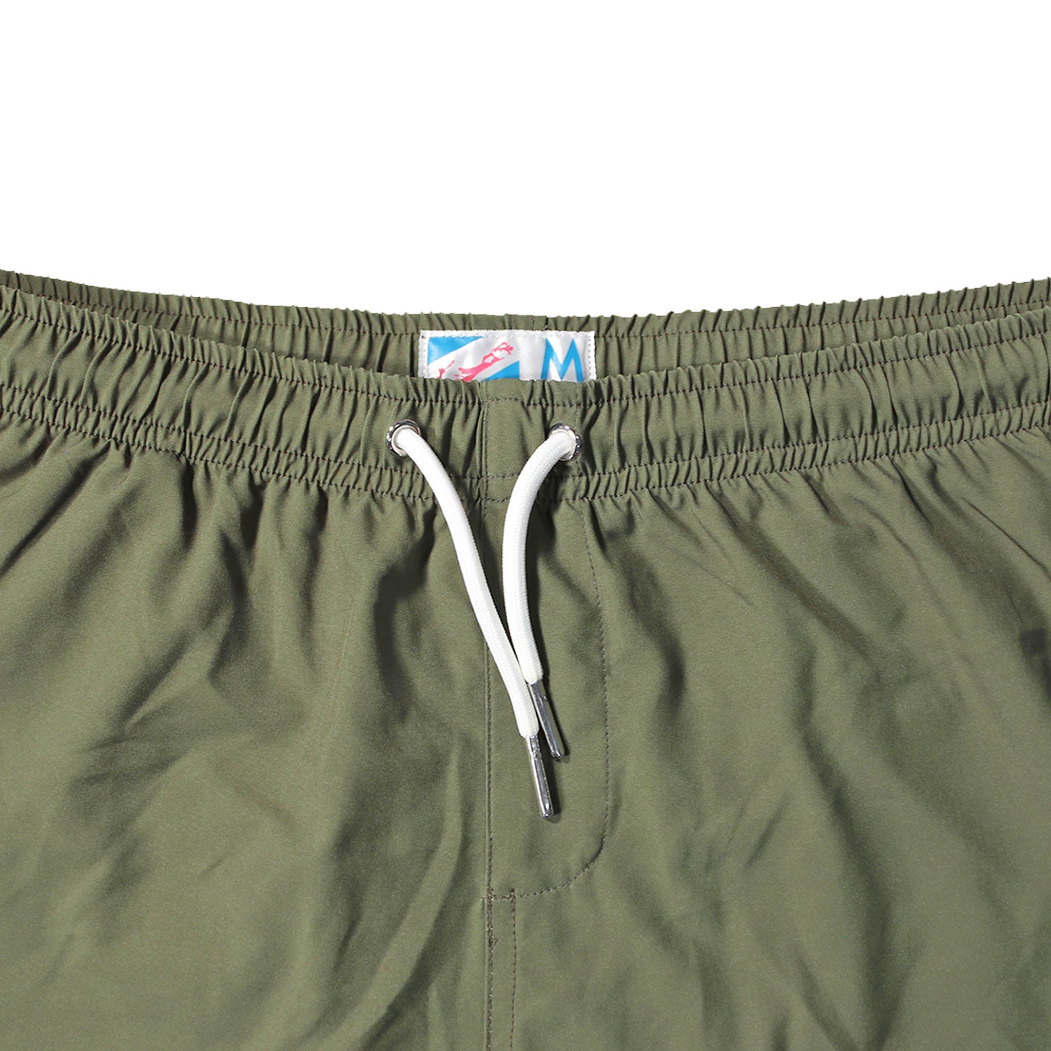 Green 5" Swim Trunks made from recycled materials, featuring a stylish design and eco-friendly attributes.