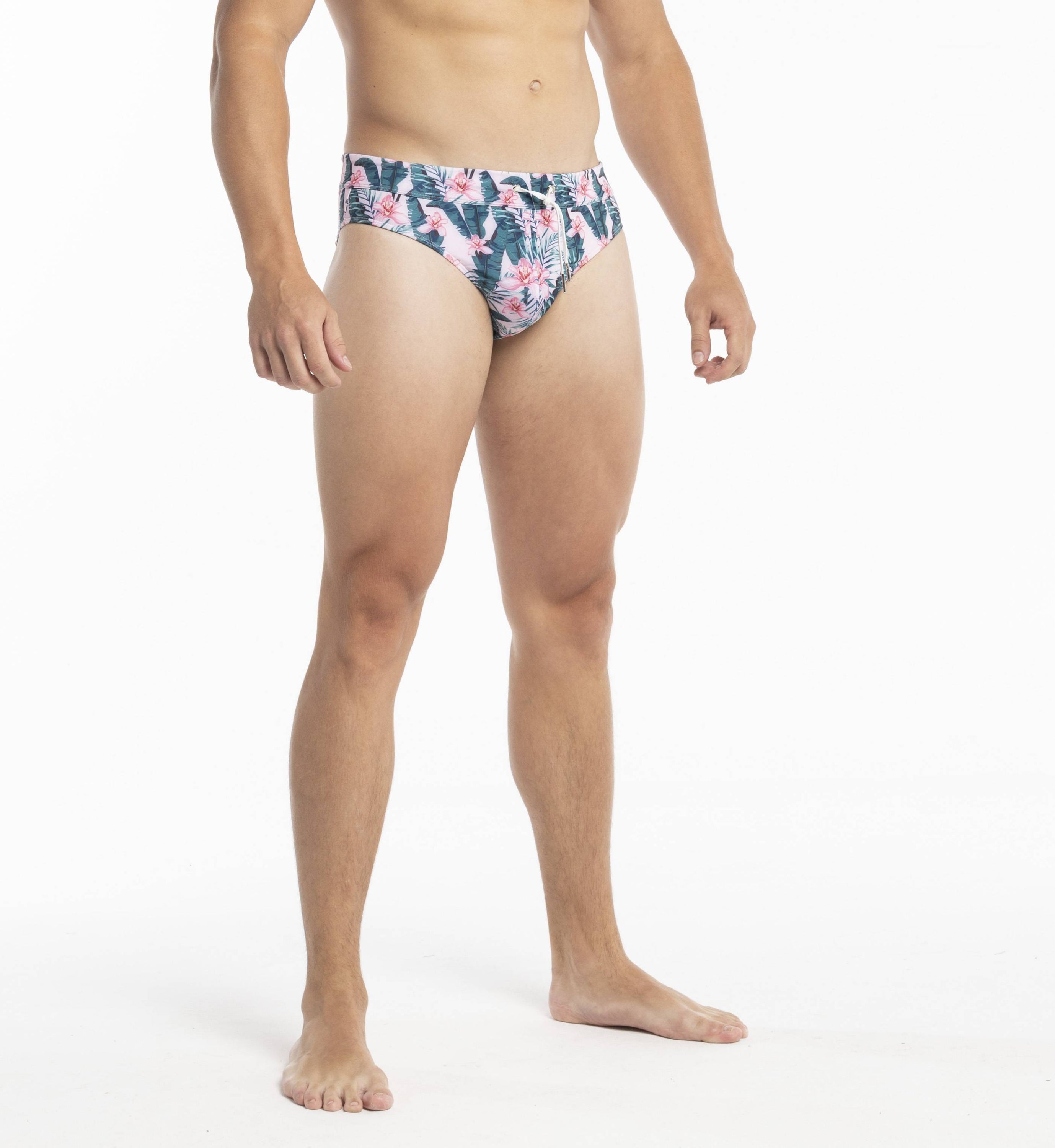 Jungle Swim Briefs featuring vibrant patterns and elastic waistband, perfect for beach and pool activities.