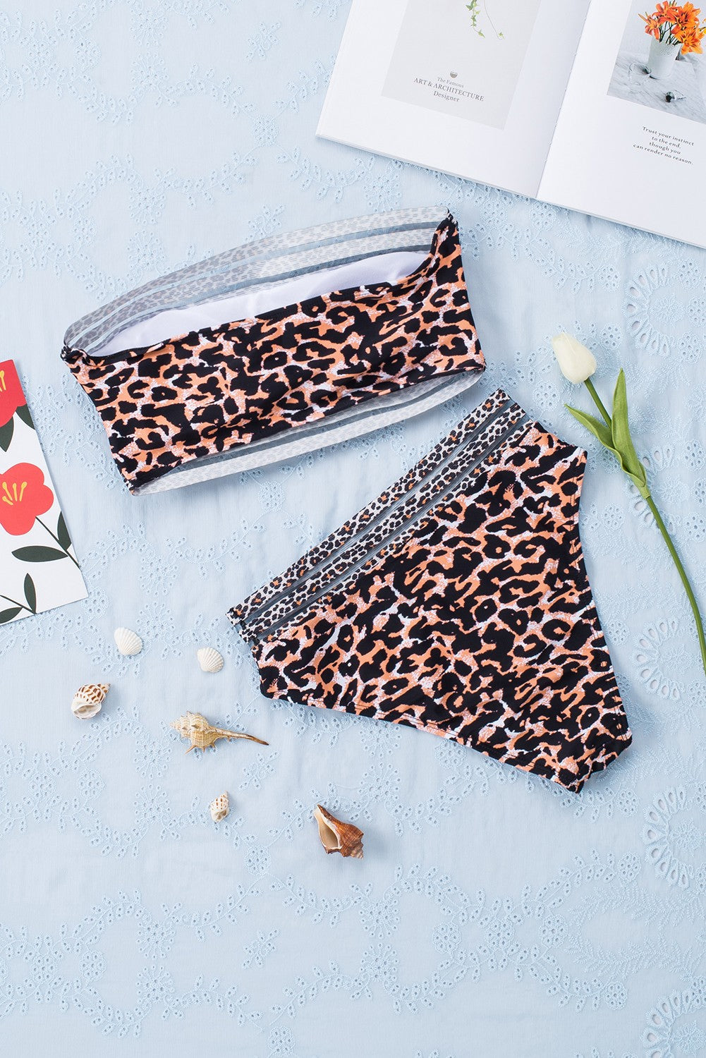 Leopard Bandeau Bikini Swimsuit featuring a stylish bandeau top and strappy waist bikini bottom with a wild leopard print design.