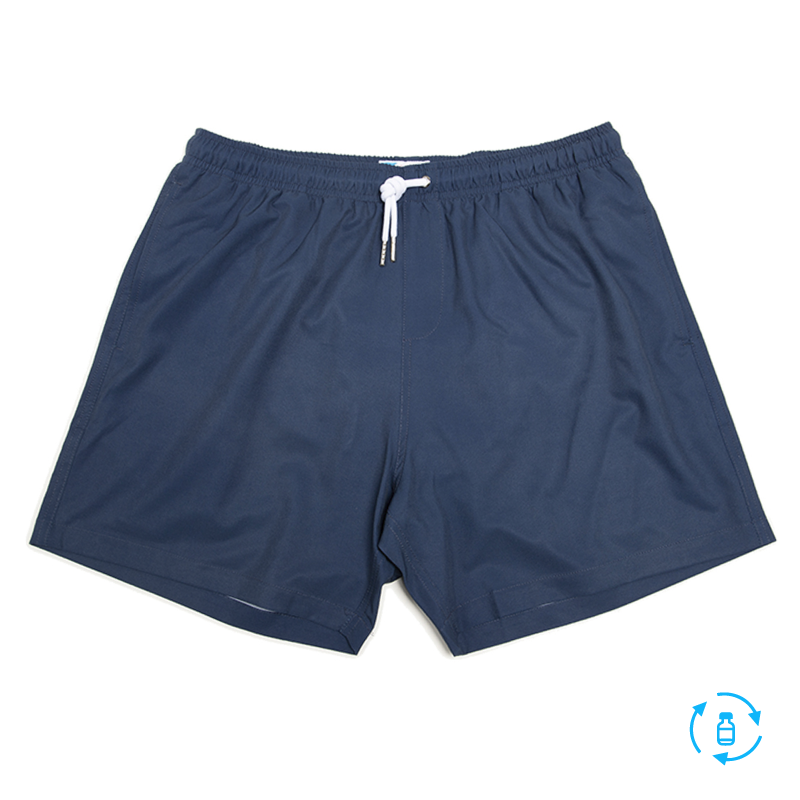 Navy swim trunks made from recycled materials, featuring a stylish design and comfortable mesh liner.