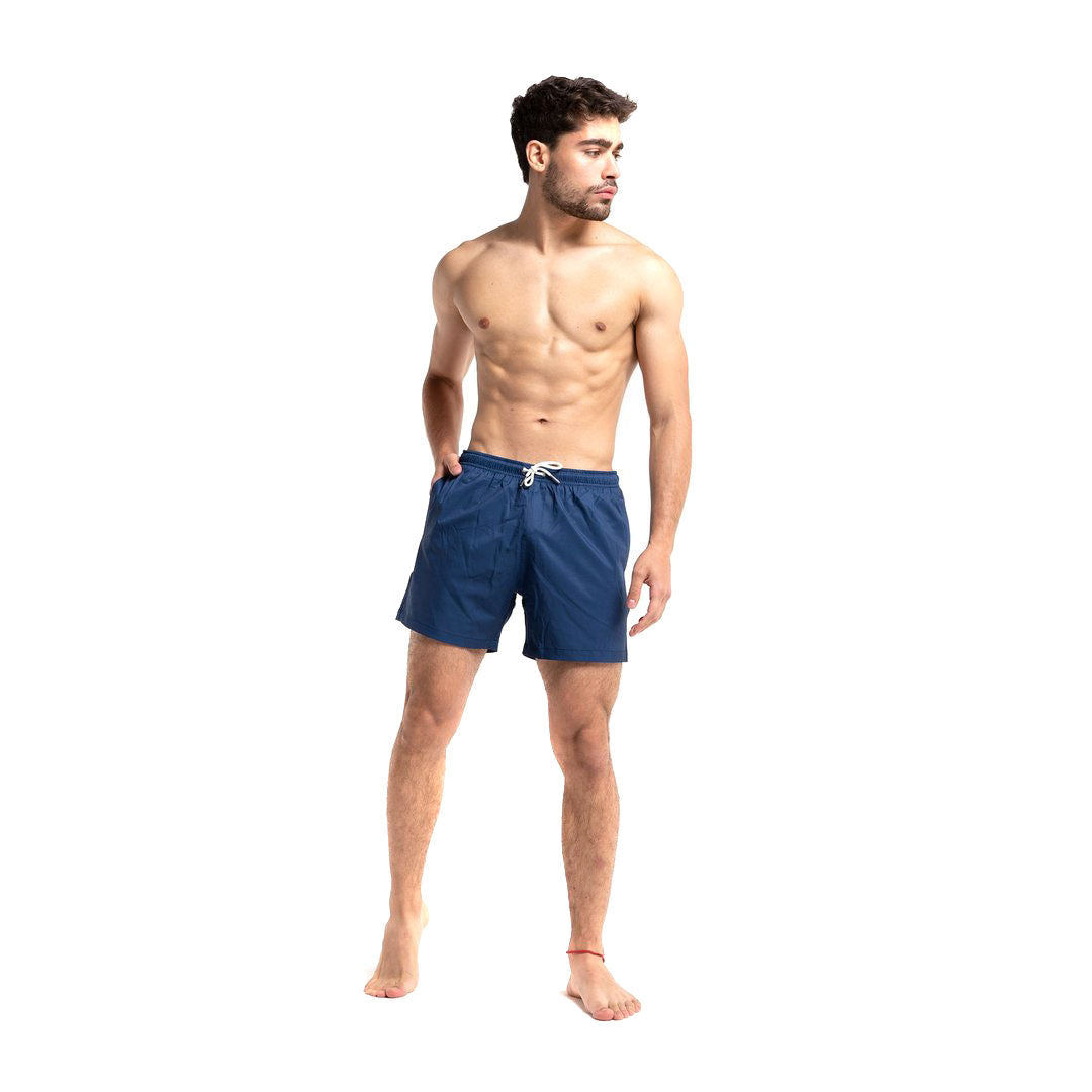 Navy swim trunks made from recycled materials, featuring a stylish design and comfortable mesh liner.