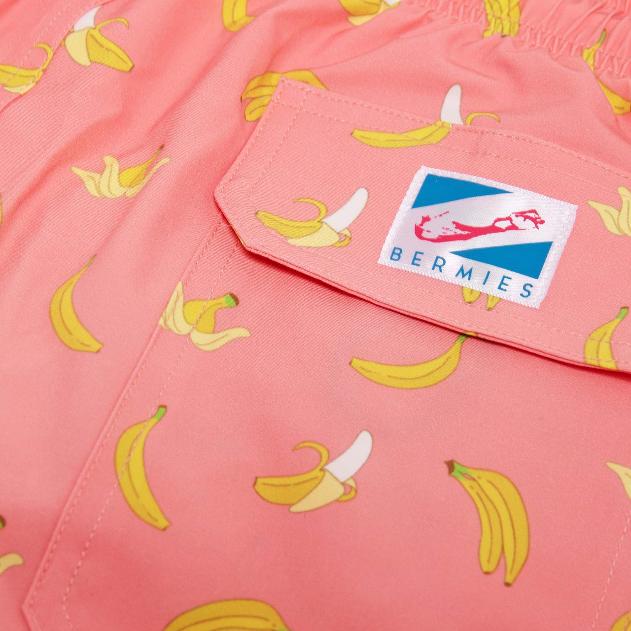 Pink Banana 5" Swim Trunks made from recycled materials, featuring a stylish design and eco-friendly attributes.