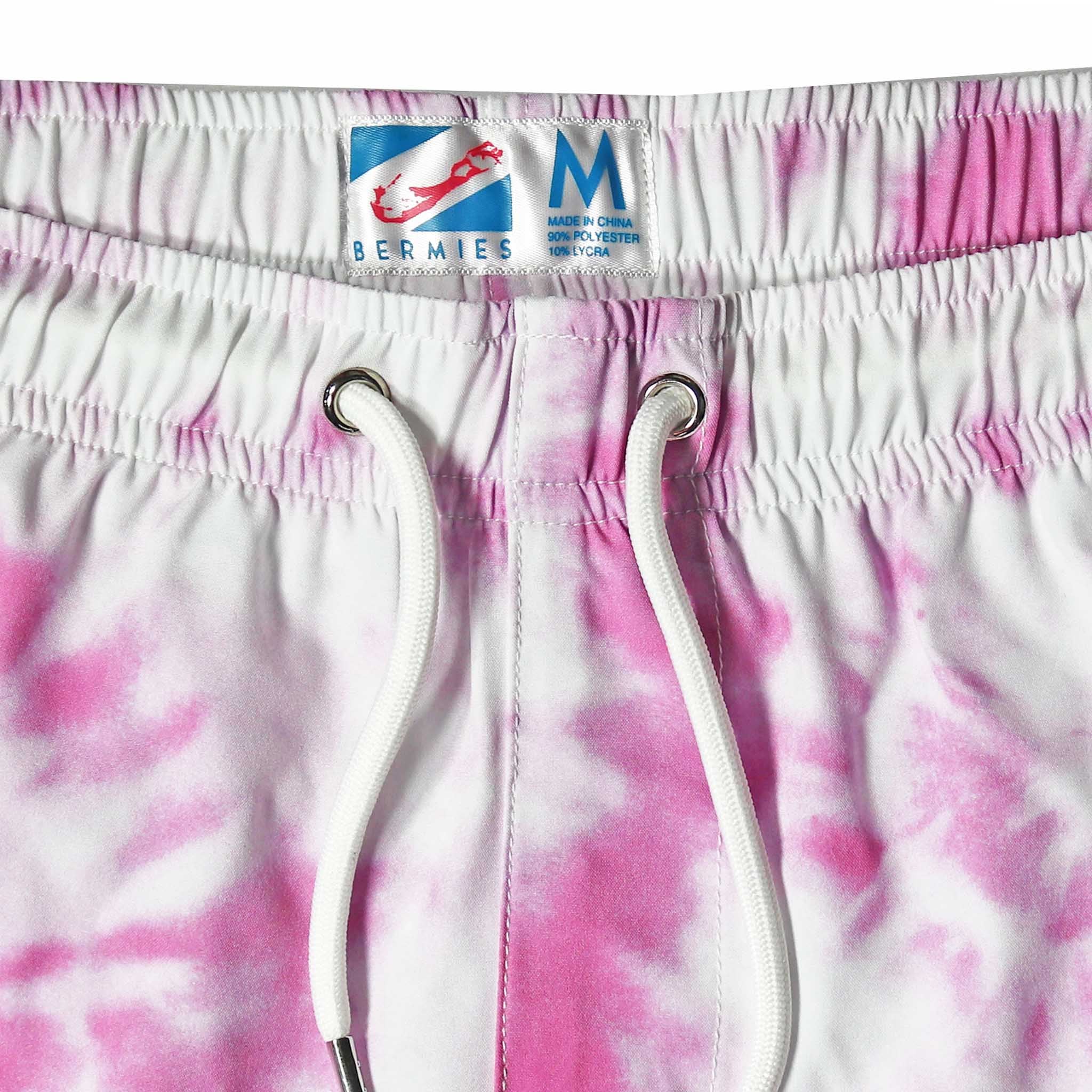 Purple Tie Dye 5" Swim Trunks made from recycled materials, featuring a stylish design and eco-friendly attributes.