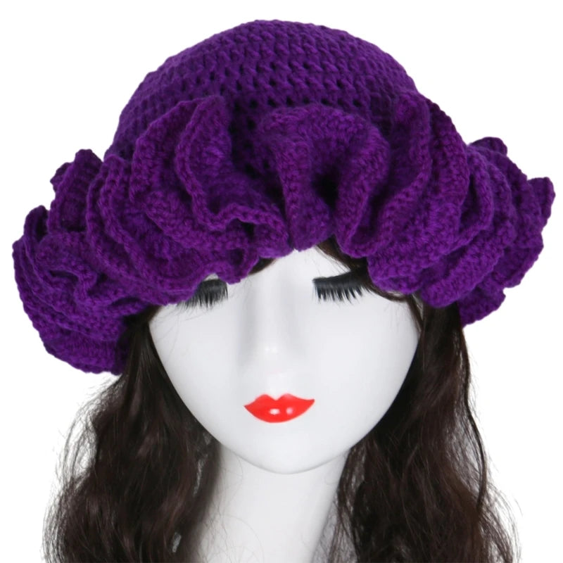 A stylish Ruffled Handmade Knit Bucket Hat with a unique ruffled brim, perfect for winter wear.