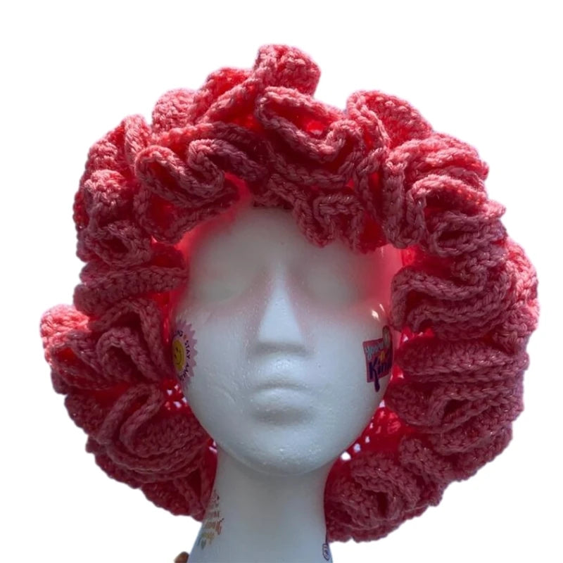 A stylish Ruffled Handmade Knit Bucket Hat with a unique ruffled brim, perfect for winter wear.