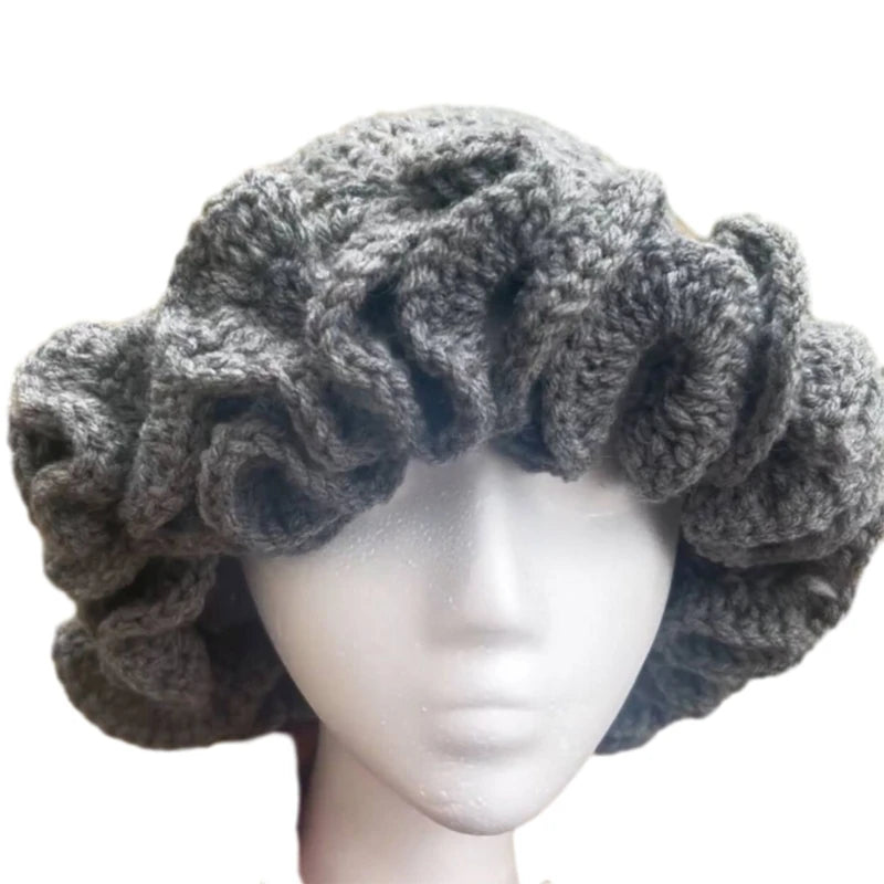 A stylish Ruffled Handmade Knit Bucket Hat with a unique ruffled brim, perfect for winter wear.