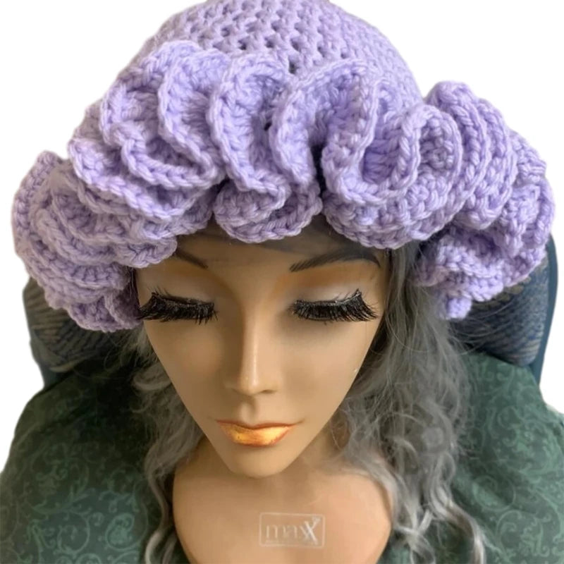 A stylish Ruffled Handmade Knit Bucket Hat with a unique ruffled brim, perfect for winter wear.