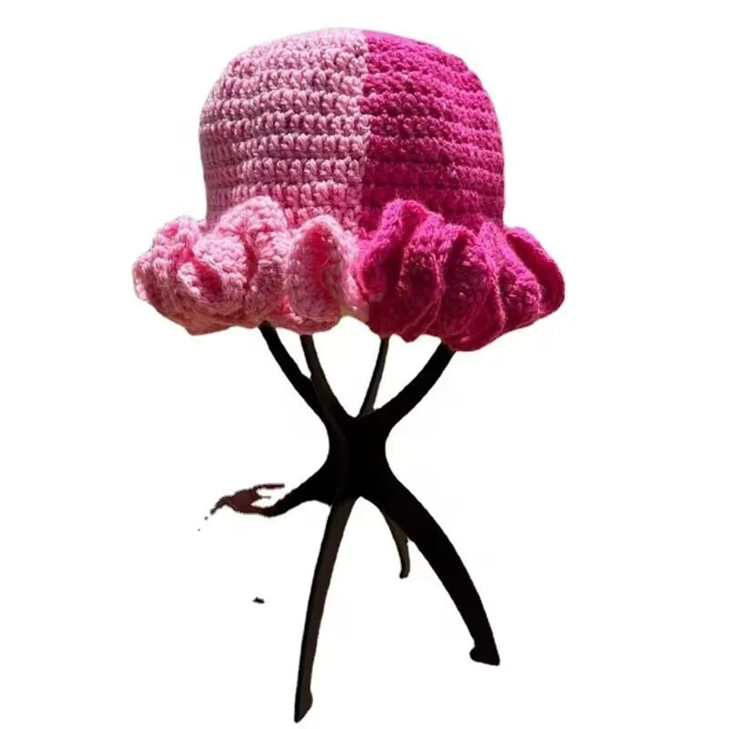 A stylish Ruffled Handmade Knit Bucket Hat with a unique ruffled brim, perfect for winter wear.