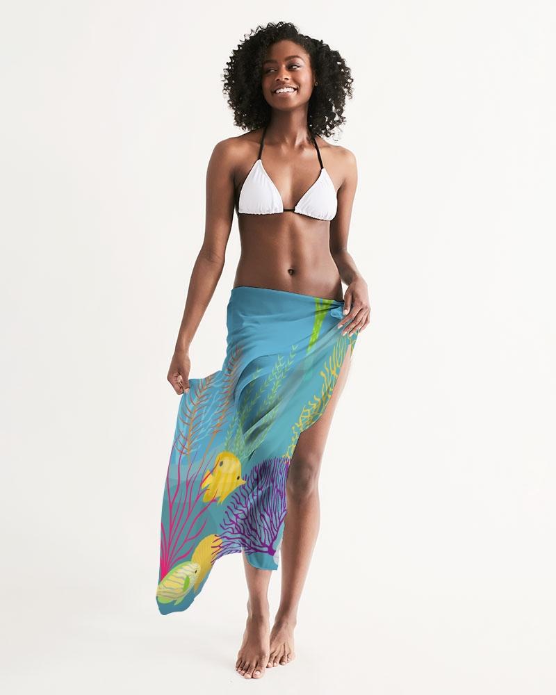 A stylish sheer aquatic blue swimsuit cover-up with a vibrant fish print, perfect for beach and poolside wear.