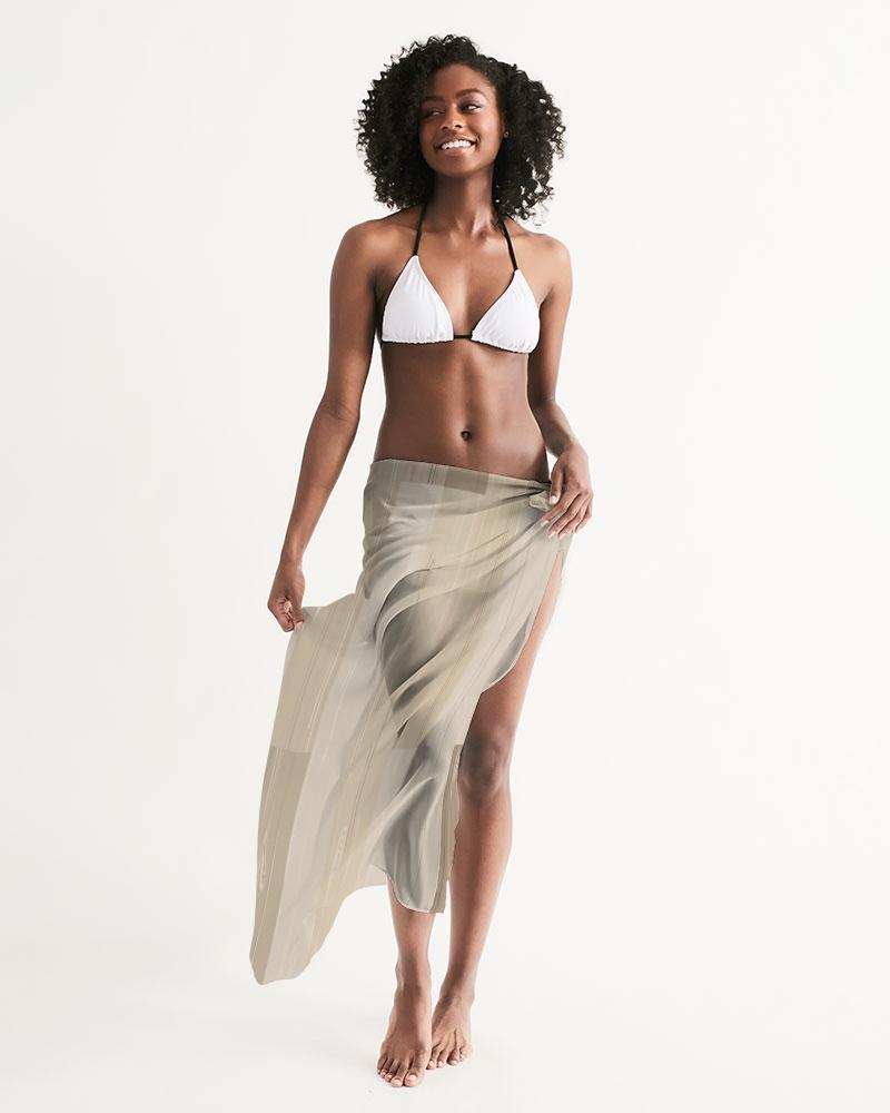 A stylish sheer beige swimsuit cover up with a flowy design, perfect for beach or poolside wear, featuring a self-tie closure.