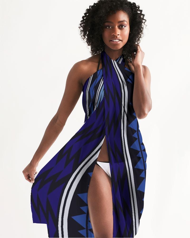 A stylish sheer bohemian blue swimsuit cover up, featuring lightweight fabric and a self-tie closure, perfect for beach and pool outings.