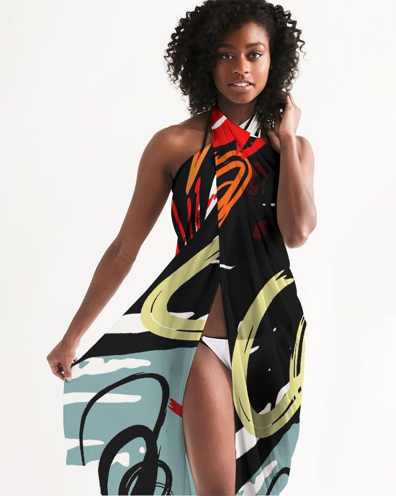 A vibrant sheer circular multicolor red swimsuit cover up, featuring an abstract design in black, gray, and white, perfect for beachwear.