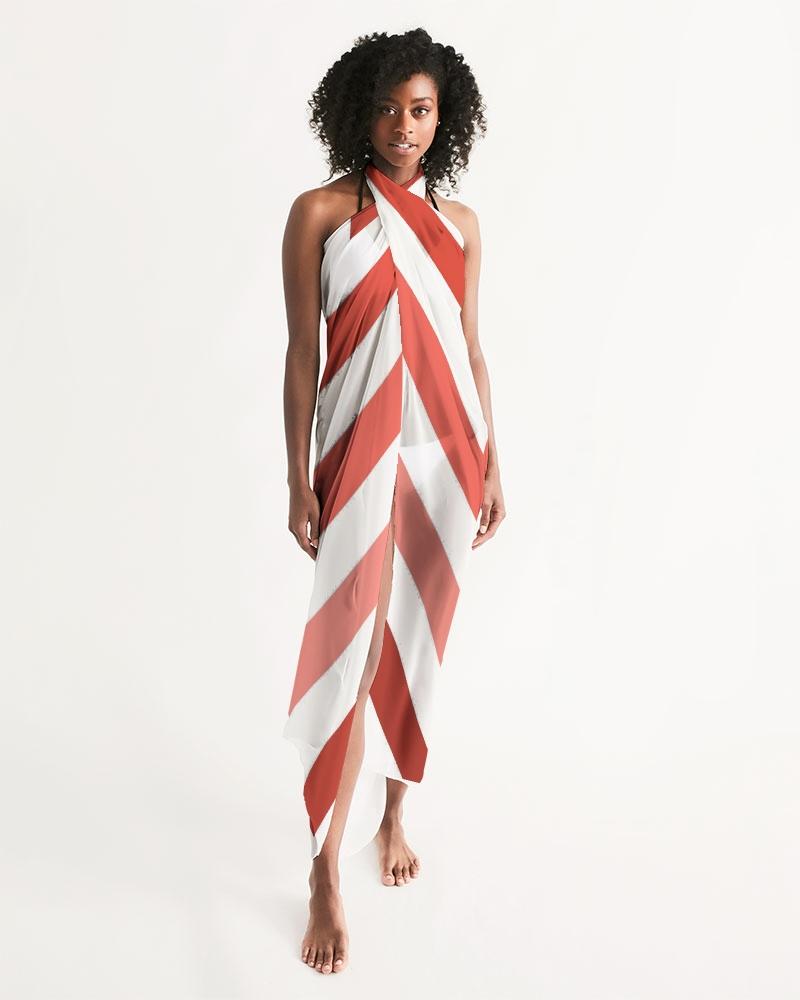 A stylish sheer red and white herringbone swimsuit cover up, lightweight and flowy, perfect for beach or poolside wear.