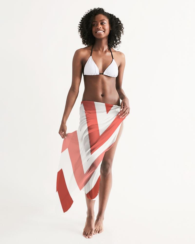 A stylish sheer red and white herringbone swimsuit cover up, lightweight and flowy, perfect for beach or poolside wear.