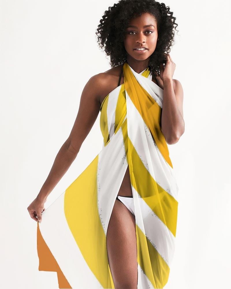 A stylish sheer yellow and white herringbone swimsuit cover up, showcasing its lightweight fabric and self-tie closure, perfect for beach outings.