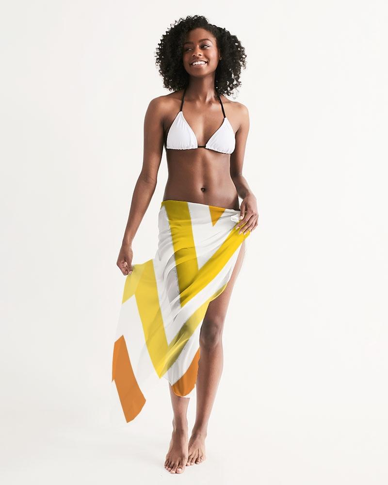 A stylish sheer yellow and white herringbone swimsuit cover up, showcasing its lightweight fabric and self-tie closure, perfect for beach outings.