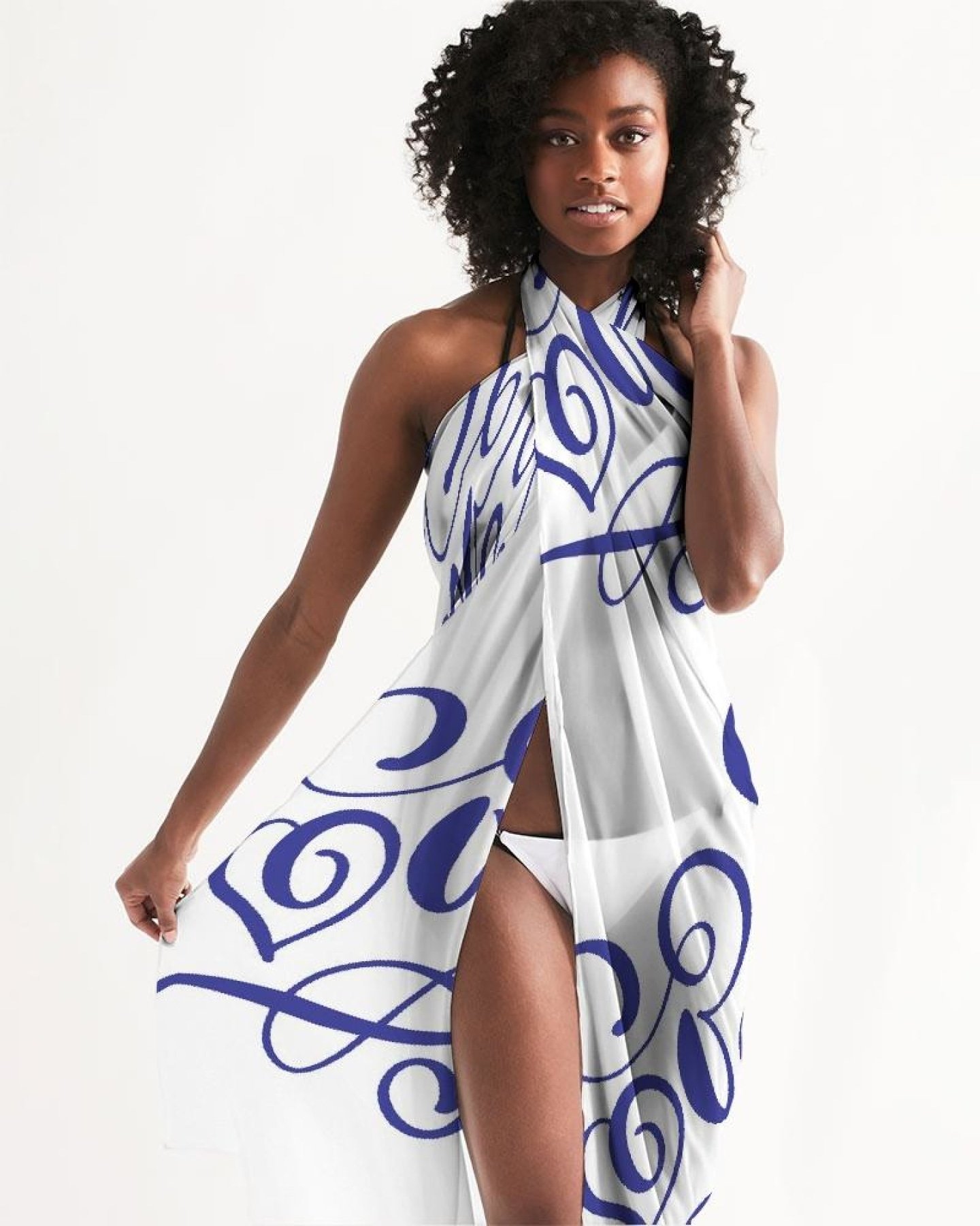 A lightweight and flowing Sheer Love Bleu Swimsuit Cover Up dress, perfect for beach and poolside wear, featuring a self-tie closure and versatile styling options.