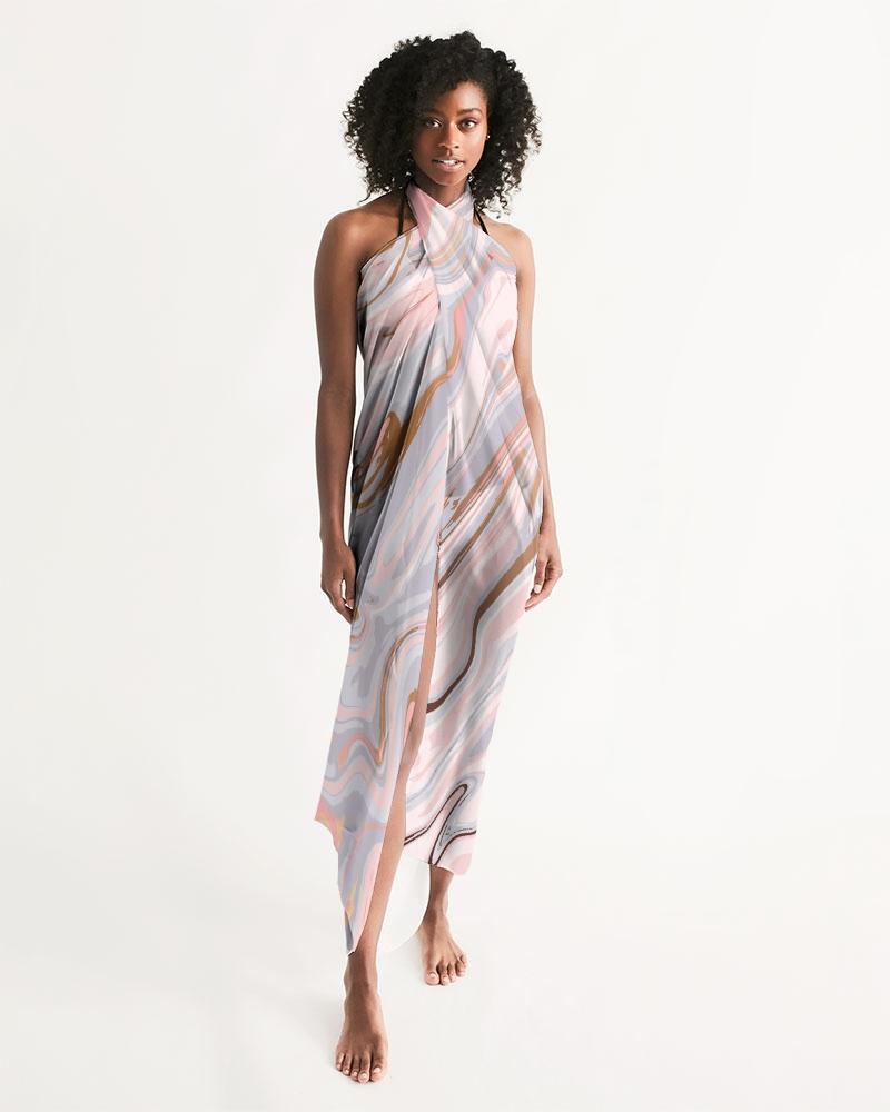 Sheer Love Marble Swimsuit Cover Up featuring pink and white marble swirl design, lightweight fabric, and self-tie closure, perfect for beach or pool.