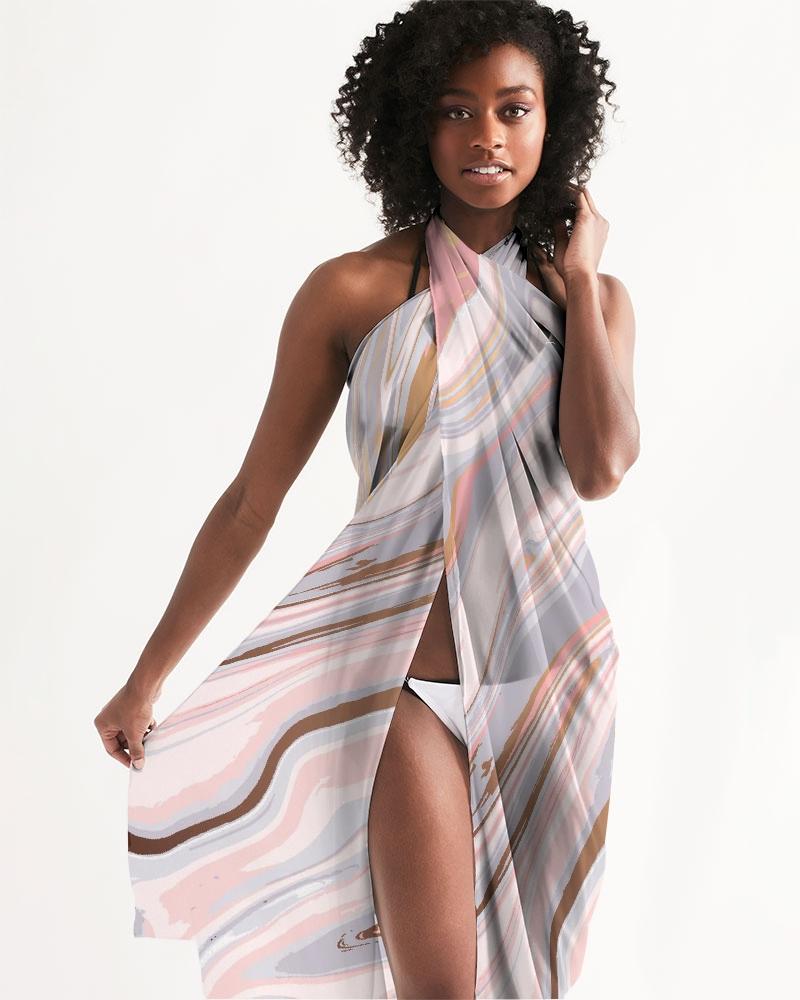 Sheer Love Marble Swimsuit Cover Up featuring pink and white marble swirl design, lightweight fabric, and self-tie closure, perfect for beach or pool.