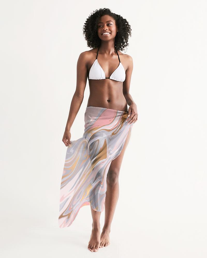 Sheer Love Marble Swimsuit Cover Up featuring pink and white marble swirl design, lightweight fabric, and self-tie closure, perfect for beach or pool.